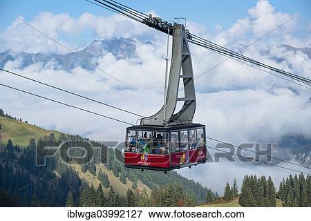 "Gondola, cable car to the mountain station, Mt Fellhorn, 2038m, at the back Mt Nebelhorn, 2224m, Oberstdorf, Allgau Alps, Allgau, Bavaria, Germany, Europe" View Large Photo Image Stock Photo - "Gondola, cable car to the mountain station, Mt Fellhorn, 2038m, at the back Mt Nebelhorn, 2224m, Oberstdorf, Allgau Alps, Allgau, Bavaria, Germany, Europe". Fotosearch