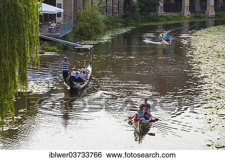 Stock Photograph - "Gondola, canoeists and rowers on the Karl-Heine Canal, Plagwitz, Leipzig, Saxony, Germany, Europe". Fotosearch