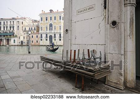 Stock Photo - "Gondola on the Grand Canal, Canal Grande, stacked raised walkways for high water at front, Naranzaria, Venice, Venezia, Veneto, Italy, Europe". Fotosearch
