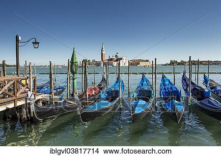 Picture - "Gondolas at the Riva degli Schiavoni, San Giorgio Maggiore at the back, Venice, Italy, Europe". Fotosearch