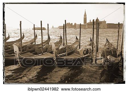 Stock Image - "Gondolas in the early morning, Venice, Italy, Europe". Fotosearch