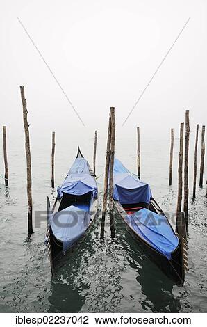 "Gondolas in the mist, St Mark's Square, Venice, Venezia, Veneto, Italy, Europe" View Large Photo Image Stock Image - "Gondolas in the mist, St Mark's Square, Venice, Venezia, Veneto, Italy, Europe". Fotosearch