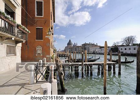 Stock Photograph - "Gondolas, jetty, Church of Santa Maria della Salute, Palazzo Vernier dai Leoni palace, Grand Canal, Venice, Veneto, Italy, Europe". Fotosearch