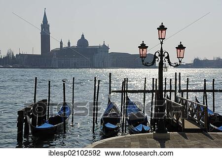 "Gondolas, looking towards the Church of San Giorgio Maggiore, Molo della Piazzetta San Marco, St. Mark's Square, Venice, Venezia, Veneto, Italy, Europe" View Large Photo Image Stock Image - "Gondolas, looking towards the Church of San Giorgio Maggiore, Molo della Piazzetta San Marco, St. Mark's Square, Venice, Venezia, Veneto, Italy, Europe". Fotosearch