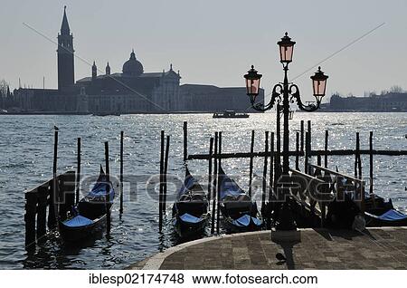 "Gondolas, view of San Giorgio Maggiore, Molo della Piazzetta, St Mark's Square, San Marco quarter, Venice, UNESCO World Heritage Site, Veneto, Italy, Europe" View Large Photo Image Stock Photo - "Gondolas, view of San Giorgio Maggiore, Molo della Piazzetta, St Mark's Square, San Marco quarter, Venice, UNESCO World Heritage Site, Veneto, Italy, Europe". Fotosearch