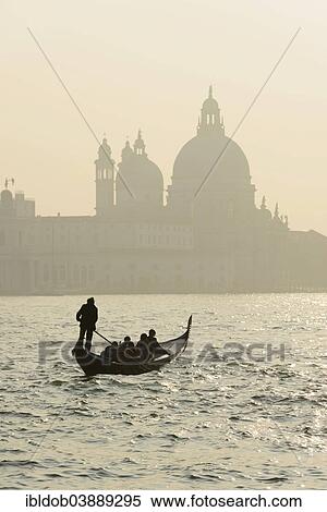 Stock Photography - "Gondolier on the Grand Canal in front of the Church of Santa Maria della Salute, Venice, Veneto, Italy, Europe". Fotosearch