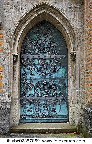 Stock Photo - "Gothic door with iron mounting at the neo-Gothic St. Ottilien Archabbey, near Landsberg, Bavaria, Germany, Europe". Fotosearch