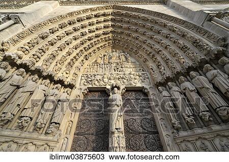 Stock Image - "Gothic figures, decorations on the main portal, west facade, Cathedral of Notre-Dame de Paris, Ile de la Cite, Paris, Ile-de-France, France, Europe". Fotosearch