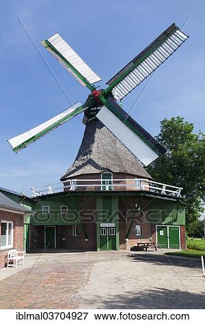 "Gott mit uns"""" Windmill, German for """"God with us"""", Dutch gallery windmill, smock windmill, with a wind rose, Eddelak, Schleswig-Holstein, Germany, Europe" View Large Photo Image Stock Photo - "Gott mit uns"""" Windmill, German for """"God with us"""", Dutch gallery windmill, smock windmill, with a wind rose, Eddelak, Schleswig-Holstein, Germany, Europe". Fotosearch