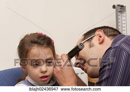 "GP doctor's surgery, patient consultation with a girl, United Kingdom, Europe" View Large Photo Image Stock Photo - "GP doctor's surgery, patient consultation with a girl, United Kingdom, Europe". Fotosearch