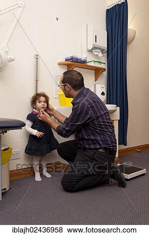 "GP doctor's surgery, patient consultation, child's height being measured, United Kingdom, Europe" View Large Photo Image Stock Photo - "GP doctor's surgery, patient consultation, child's height being measured, United Kingdom, Europe". Fotosearch