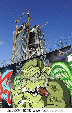 Graffiti in front of the construction site of the new ECB, European Central Bank, Frankfurt am Main, Hesse, Germany, Europe View Large Photo Image Stock Photo - Graffiti in front of the construction site of the new ECB, European Central Bank, Frankfurt am Main, Hesse, Germany, Europe. Fotosearch