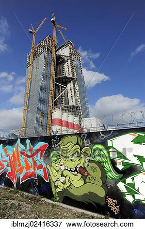 Graffiti in front of the construction site of the new ECB, European Central Bank, Frankfurt am Main, Hesse, Germany, Europe View Large Photo Image Stock Photo - Graffiti in front of the construction site of the new ECB, European Central Bank, Frankfurt am Main, Hesse, Germany, Europe. Fotosearch
