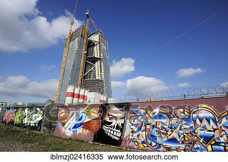 Graffiti in front of the construction site of the new ECB, European Central Bank, Frankfurt am Main, Hesse, Germany, Europe View Large Photo Image Stock Photography - Graffiti in front of the construction site of the new ECB, European Central Bank, Frankfurt am Main, Hesse, Germany, Europe. Fotosearch