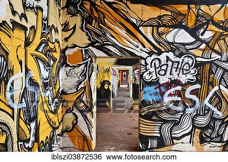 Stock Photograph - "Graffiti wall in the Rhine Park, Duisburg, Ruhr district, North Rhine-Westphalia, Germany, Europe". Fotosearch