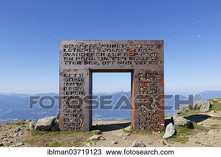 "Granattor, sculpture by Michael Printschler, Lammersdorfer Berg, Millstatter Alpe massif, Central Eastern Alps, near Lammersdorf, Carinthia, Austria, Europe" View Large Photo Image Stock Image - "Granattor, sculpture by Michael Printschler, Lammersdorfer Berg, Millstatter Alpe massif, Central Eastern Alps, near Lammersdorf, Carinthia, Austria, Europe". Fotosearch