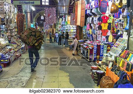 "Grand Bazaar, man carrying carpets, Istanbul, Turkey, Asia" View Large Photo Image Stock Image - "Grand Bazaar, man carrying carpets, Istanbul, Turkey, Asia". Fotosearch