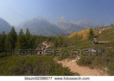 Stock Photo - "Grand Teton mountain range from the trail to Taggart Lake, Grand Teton National Park, Wyoming, USA". Fotosearch