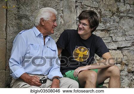 "Grandfather and grandson in conversation, Cordes-sur-Ciel, Departement Tarn, Midi-Pyrenees, France, Europe" View Large Photo Image Stock Photograph - "Grandfather and grandson in conversation, Cordes-sur-Ciel, Departement Tarn, Midi-Pyrenees, France, Europe". Fotosearch
