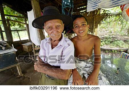 "Grandfather and grandson, Poxoreo, Mato Grosso, Brazil, South America" View Large Photo Image Stock Photograph - "Grandfather and grandson, Poxoreo, Mato Grosso, Brazil, South America". Fotosearch