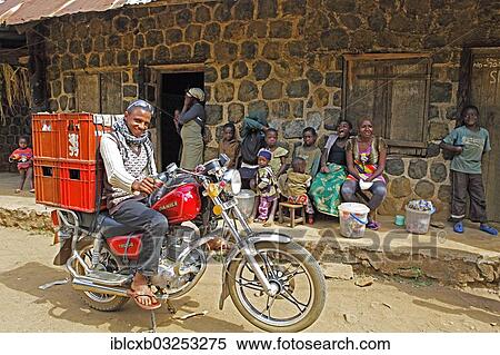 Stock Photography - "Grandson of King Yu Vincent at the entrance to the Palace of Laikom, Laikom, Northwest Region, Cameroon, Africa". Fotosearch