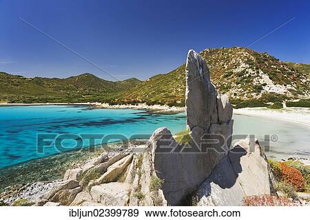 "Granite pinnacle on the beach of Punta Molentis, Villasimius, Sarrabus, Cagliari province, Sardinia, Italy, Europe" View Large Photo Image Stock Photo - "Granite pinnacle on the beach of Punta Molentis, Villasimius, Sarrabus, Cagliari province, Sardinia, Italy, Europe". Fotosearch