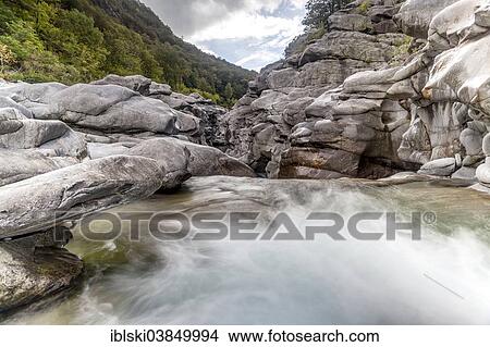 "Granite rock formations in the Maggia river in the Maggia Valley, Valle Maggia, Ponte Brolla, Canton of Ticino, Switzerland, Europe" View Large Photo Image Picture - "Granite rock formations in the Maggia river in the Maggia Valley, Valle Maggia, Ponte Brolla, Canton of Ticino, Switzerland, Europe". Fotosearch