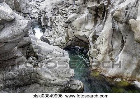"Granite rock formations in the Maggia river in the Maggia Valley, Valle Maggia, Ponte Brolla, Canton of Ticino, Switzerland, Europe" View Large Photo Image Stock Photograph - "Granite rock formations in the Maggia river in the Maggia Valley, Valle Maggia, Ponte Brolla, Canton of Ticino, Switzerland, Europe". Fotosearch
