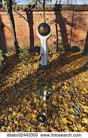 Stock Image - "Grave, Ostfriedhof cemetery, Munich, Bavaria, Germany, Europe". Fotosearch