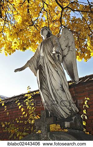 Stock Photograph - "Grave with an angel statue, Ostfriedhof cemetery, Munich, Bavaria, Germany, Europe". Fotosearch