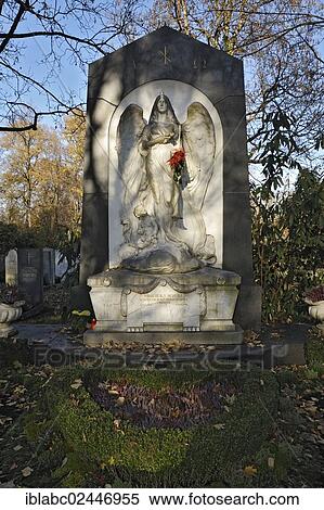 "Grave with angel statue on the Ostfriedhof or East Cemetery, Munich, Bavaria, Germany, Europe" View Large Photo Image Stock Photography - "Grave with angel statue on the Ostfriedhof or East Cemetery, Munich, Bavaria, Germany, Europe". Fotosearch