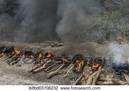 "Gravel and hot tar being mixed on open fires at a road construction site, Shimla, Himachal Pradesh, India, Asia" View Large Photo Image Stock Image - "Gravel and hot tar being mixed on open fires at a road construction site, Shimla, Himachal Pradesh, India, Asia". Fotosearch