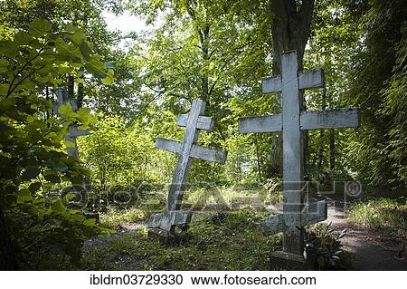 "Graves in the cemetery at the Monastery of the Old Believers, the Filippians or Philippians, on the shores of Lake Dus, Wojnowo, Warmian-Masurian Voivodeship, Poland, Europe" View Large Photo Image Stock Image - "Graves in the cemetery at the Monastery of the Old Believers, the Filippians or Philippians, on the shores of Lake Dus, Wojnowo, Warmian-Masurian Voivodeship, Poland, Europe". Fotosearch