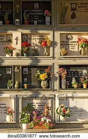 "Graves in the columbarium for above ground burials, grave niches with plaques, graveyard, Bassano Romano, Lazio, Italy, Europe" View Large Photo Image Stock Photo - "Graves in the columbarium for above ground burials, grave niches with plaques, graveyard, Bassano Romano, Lazio, Italy, Europe". Fotosearch