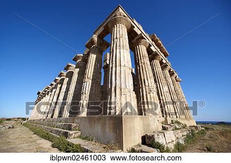 Stock Image - "Greek Doric columns at the ruins of Temple F at Selinunte, Sicily, Italy, Europe". Fotosearch