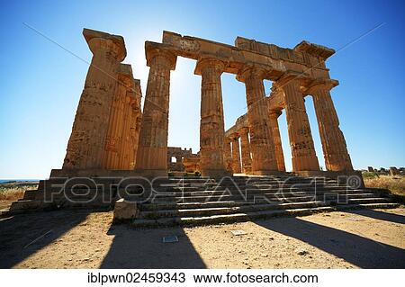 Stock Image - "Greek Doric temple ruins of Temple F at Selinunte, Sicily, Italy, Europe". Fotosearch