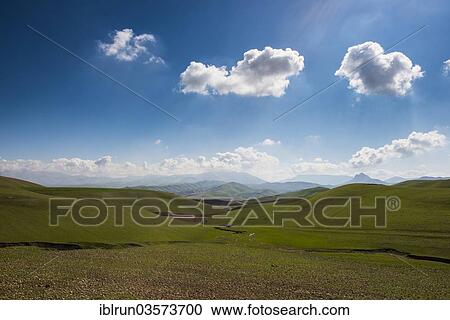 Stock Image - "Green hilly landscape, on the border of Iran, Darbandikhan, Iraqi Kurdistan, Iraq, Asia". Fotosearch