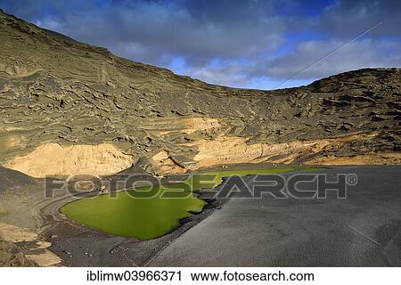 "Green lagoon, volcanic lake discolored by green algae, lava beach, Charco de los Clicos in El Golfo, Lanzarote, Canary Islands, Spain, Europe" View Large Photo Image Stock Image - "Green lagoon, volcanic lake discolored by green algae, lava beach, Charco de los Clicos in El Golfo, Lanzarote, Canary Islands, Spain, Europe". Fotosearch