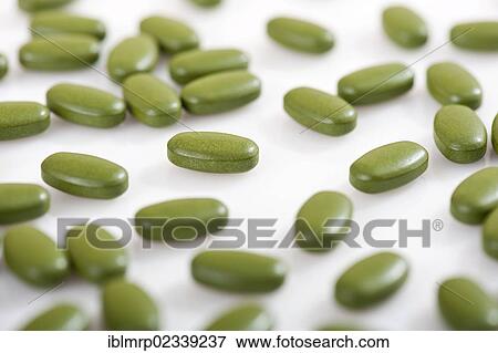 Green tablets View Large Photo Image Stock Photo - Green tablets. Fotosearch