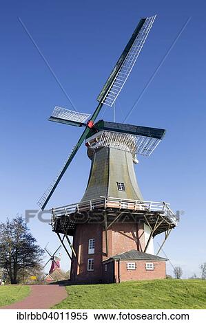 "Green windmill, Greetsiel twin mills, Greetsiel, Krummhorn, East Frisia, Lower Saxony, Germany, Europe" View Large Photo Image Stock Photography - "Green windmill, Greetsiel twin mills, Greetsiel, Krummhorn, East Frisia, Lower Saxony, Germany, Europe". Fotosearch