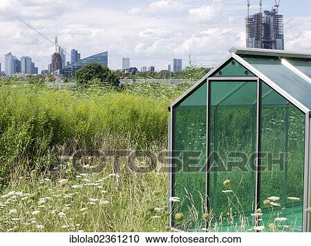 Stock Image - "Greenhouses erected as the Green Sauce Monument, Frankfurt-Oberrad, Frankfurt am Main, Hesse, Germany, Europe". Fotosearch