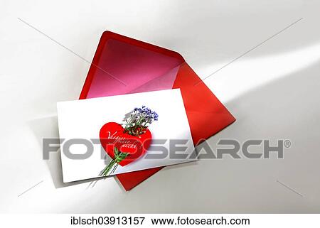Greeting card with a red envelope and forget-me-not nosegay View Large Photo Image Stock Photo - Greeting card with a red envelope and forget-me-not nosegay. Fotosearch