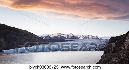"Grey Glacier, Lago Grey, Grey Lake, glacial lake, ice front, glacier moraine, evening light with atmospheric clouds, sunset, Torres del Paine National Park, Chile, South America" View Large Photo Image Stock Image - "Grey Glacier, Lago Grey, Grey Lake, glacial lake, ice front, glacier moraine, evening light with atmospheric clouds, sunset, Torres del Paine National Park, Chile, South America". Fotosearch