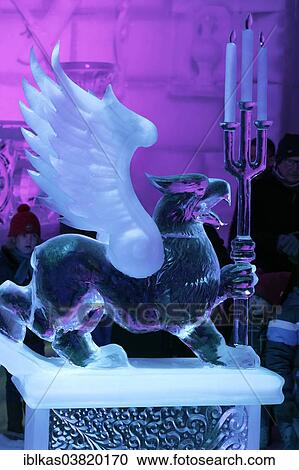 "Griffin figure made of ice holding candlesticks made of ice, Ice Sculpture Festival, Bruges, West Flanders, Belgium, Europe" View Large Photo Image Stock Image - "Griffin figure made of ice holding candlesticks made of ice, Ice Sculpture Festival, Bruges, West Flanders, Belgium, Europe". Fotosearch