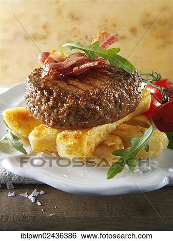 Grilled beef burger with fries and salad View Large Photo Image Stock Photograph - Grilled beef burger with fries and salad. Fotosearch