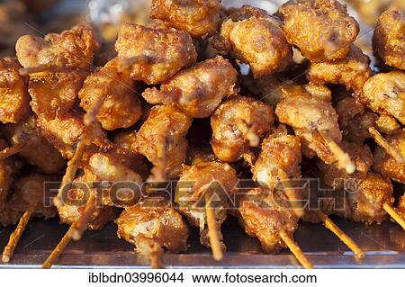 "Grilled meat skewers on sale at a market, Ayutthaya, Thailand, Asia" View Large Photo Image Picture - "Grilled meat skewers on sale at a market, Ayutthaya, Thailand, Asia". Fotosearch