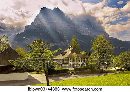 Stock Image - "Grindelwald house in front of the Eiger, Grindelwald, Canton of Bern, Switzerland, Europe". Fotosearch
