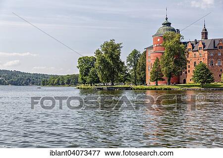 Stock Photo - "Gripsholm Castle reflected in Lake Malaren, Mariefred, Strangnas, Sodermanland lan, near Stockhom, Sweden, Europe". Fotosearch