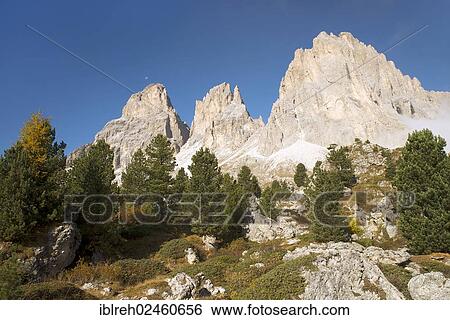 Stock Photograph - "Grohmannspitze Mountain, Fuenffingerspitze Mountain and Langkofeleck Mountain, seen from the Passo Sella mountain pass, Sassolungo Mountain, Dolomites, Alto Adige, Italy, Europe". Fotosearch