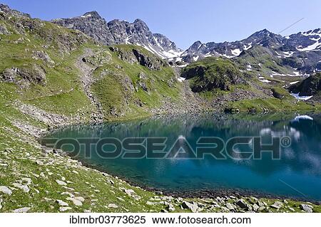 "Grosser Schwarzsee Lake, Mt Schwarzwandscharte at back, South Tyrol, Trentino-Alto Adige, Italy, Europe" View Large Photo Image Stock Photography - "Grosser Schwarzsee Lake, Mt Schwarzwandscharte at back, South Tyrol, Trentino-Alto Adige, Italy, Europe". Fotosearch